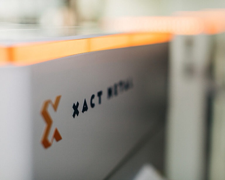 Global sales team promoting Xact Metal's affordable metal 3d printers
