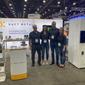 Affordable metal 3d printing by Xact Metal: team at Rapid + TCT 2022