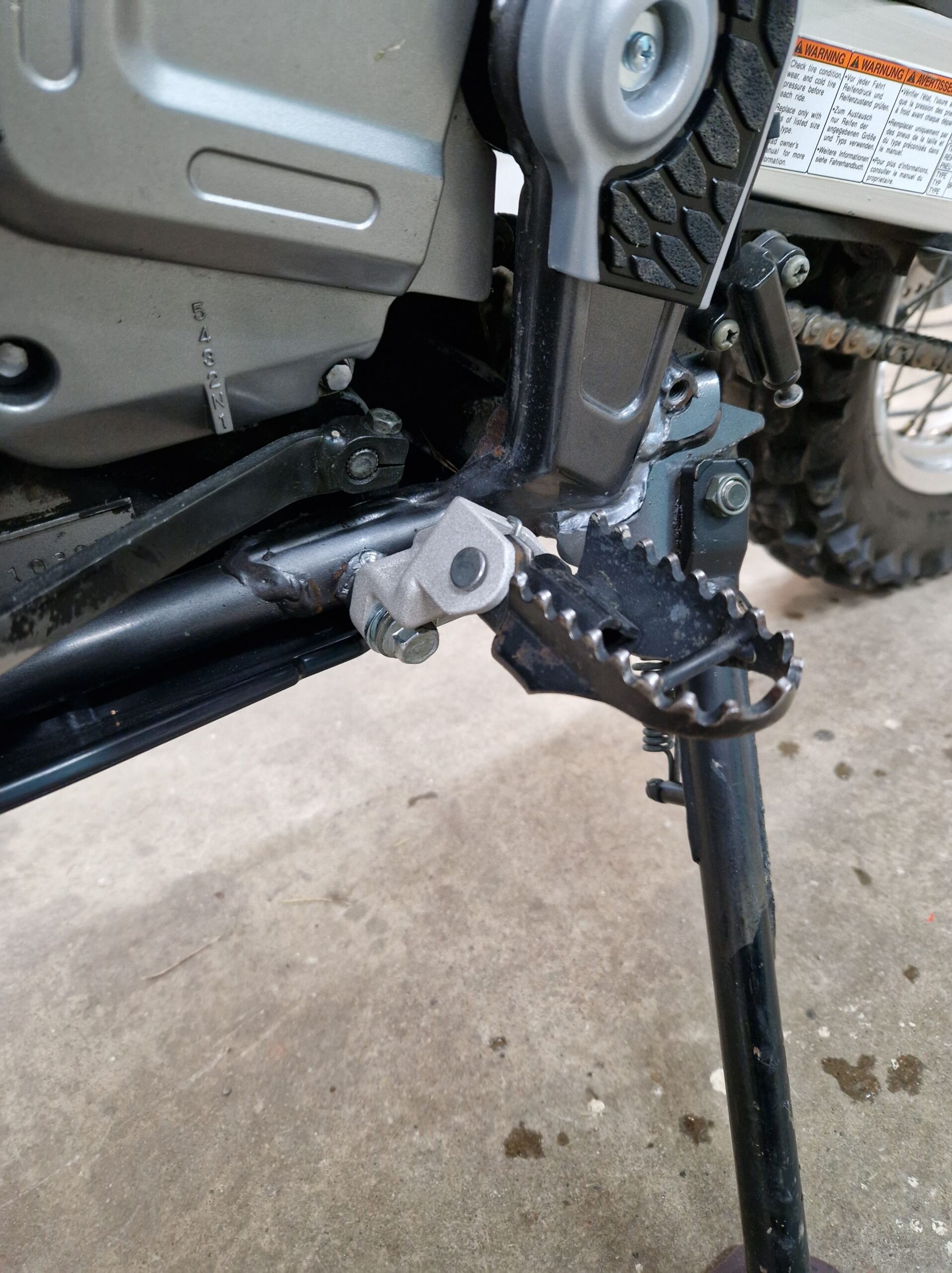 Cheap metal 3D provides bracket for Suzuki bike.